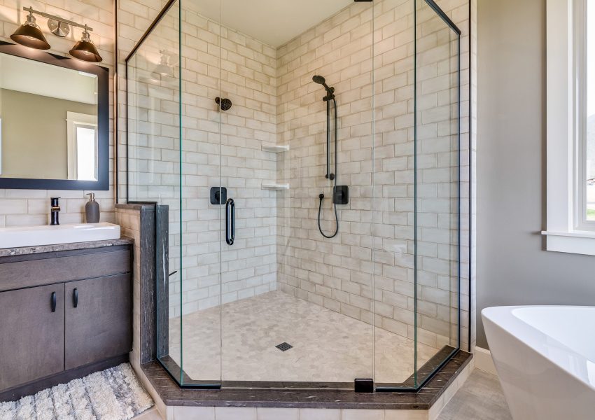 White subway tile and black matte shower head and fixtures